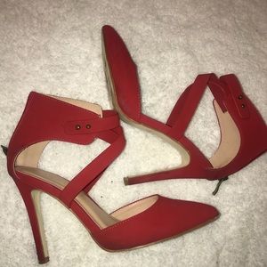 Red pointed toe shoes